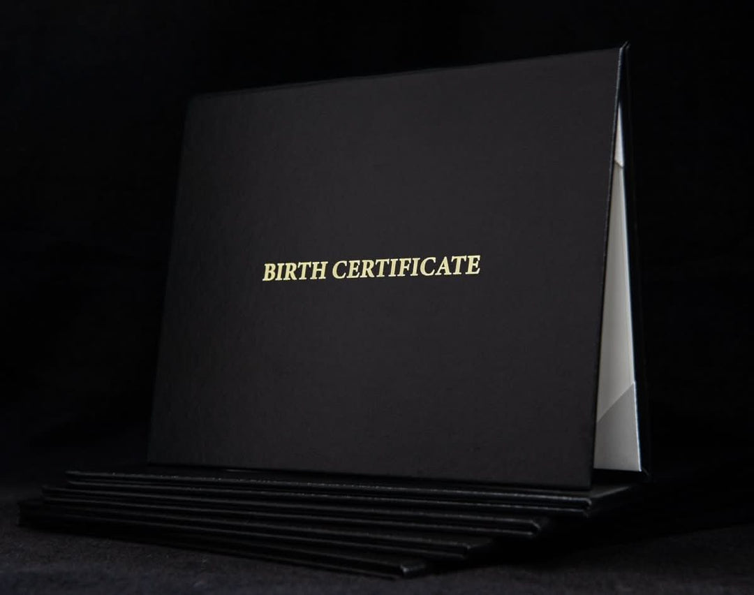 Custom engraved cover for birth certificate by Hey Congrats! features elegant design and personalized engraving on durable material.