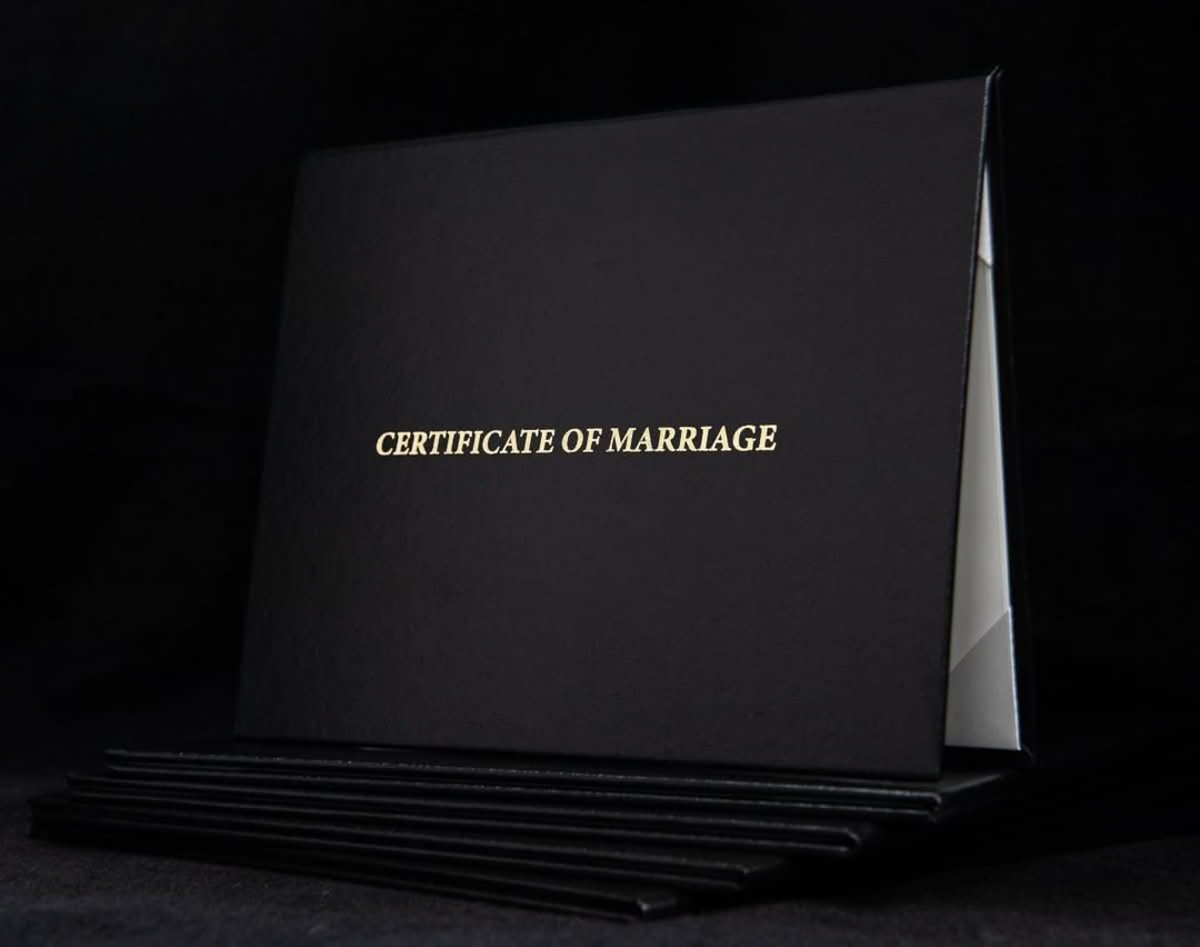 Engraved marriage certificate cover with elegant design, personalized with "Hey Congrats!" branding, for preserving wedding documents.