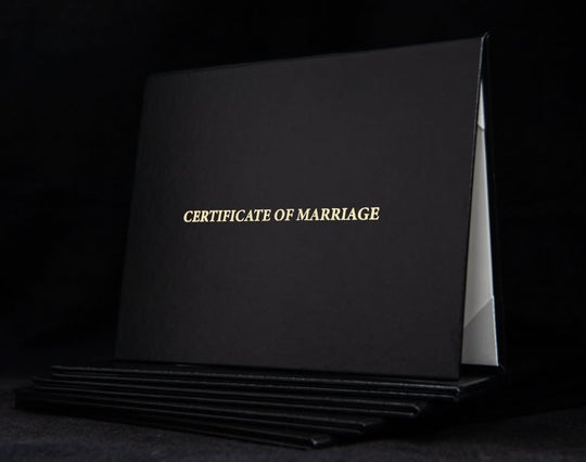 Engraved marriage certificate cover with elegant design, personalized with "Hey Congrats!" branding, for preserving wedding documents.